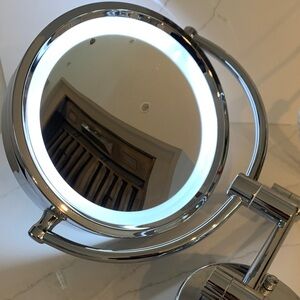 Makeup Mirror w/lights- swivels, one side magnified. Extendable arm. Wall Mount.